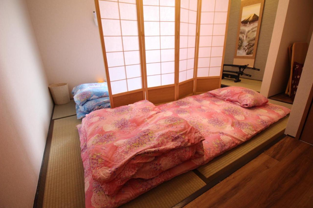 ゲストハウスaiki Ōsaka Extérieur photo